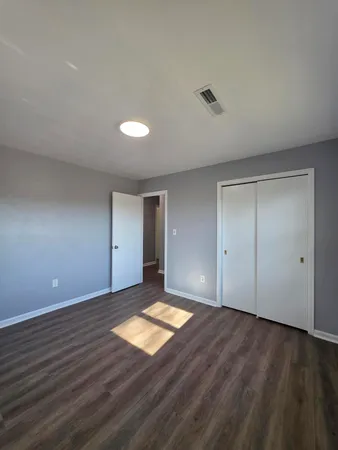 a view of an empty room and window