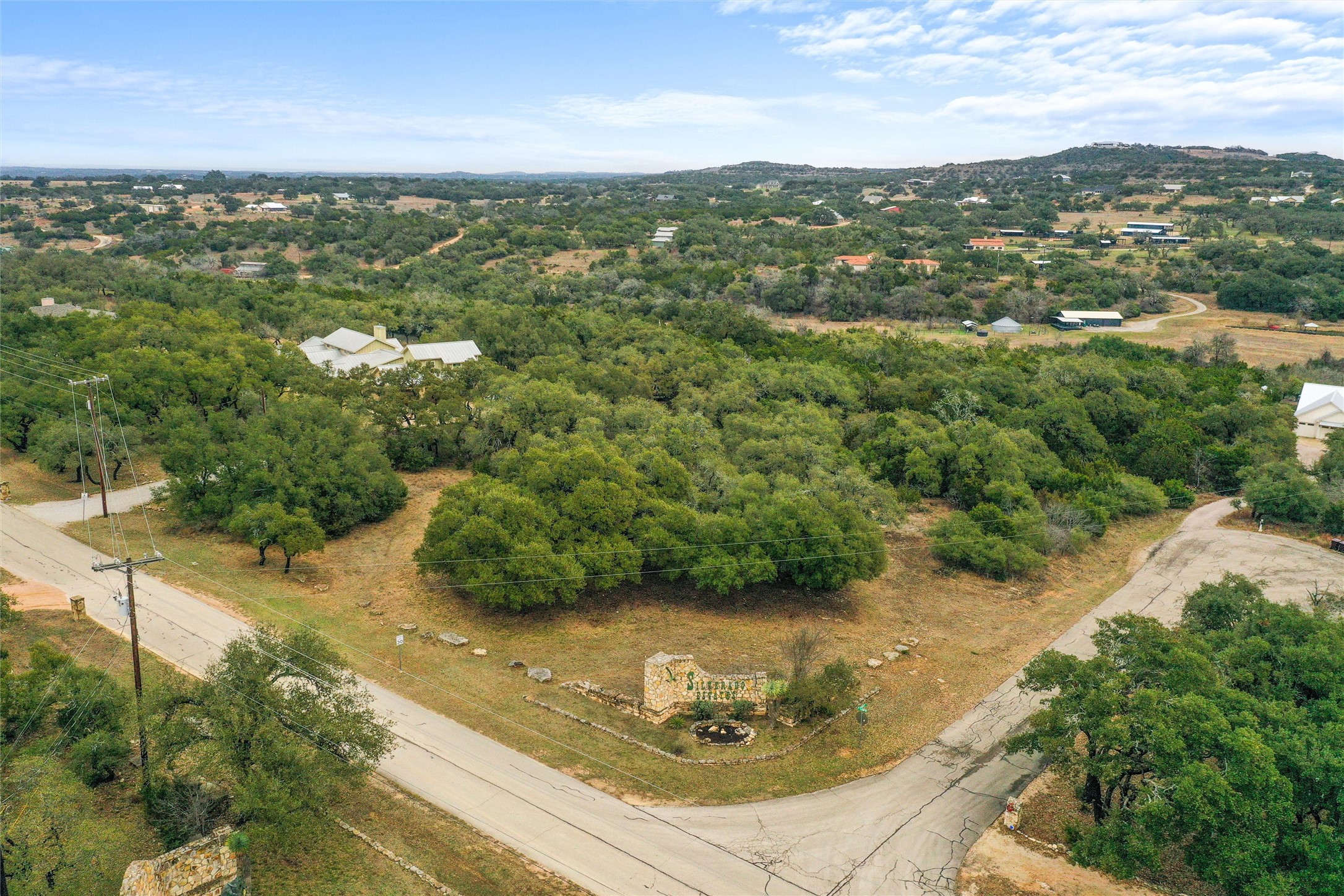 1080 Beauchamp Road Dripping Springs, TX 78620 - Photo 2 of 15 A gorgeous corner lot filled with oaks.