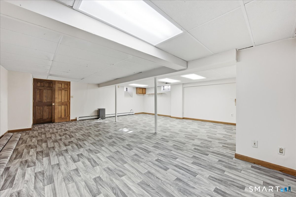 17 Inchcliffe Drive Ledyard, CT 06335 - Photo 26 of 40 a view of empty room with wooden floor