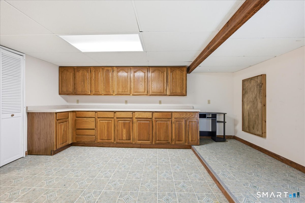 17 Inchcliffe Drive Ledyard, CT 06335 - Photo 27 of 40 a kitchen with sink and cabinets