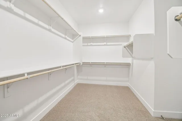 a view of an empty walk in closet