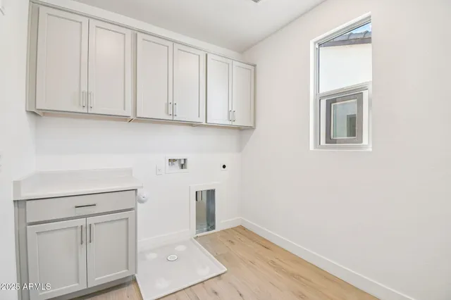 a view of an empty room with closet