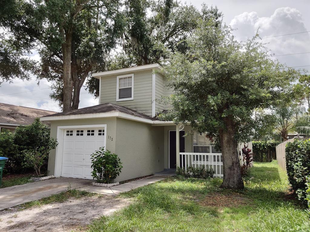 172 Oak Grove Road Winter Park, FL 32789 - Photo 1 of 1 front view of a house with a yard