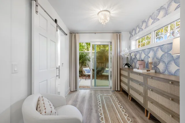 a spacious bathroom with a double vanity sink and a mirror
