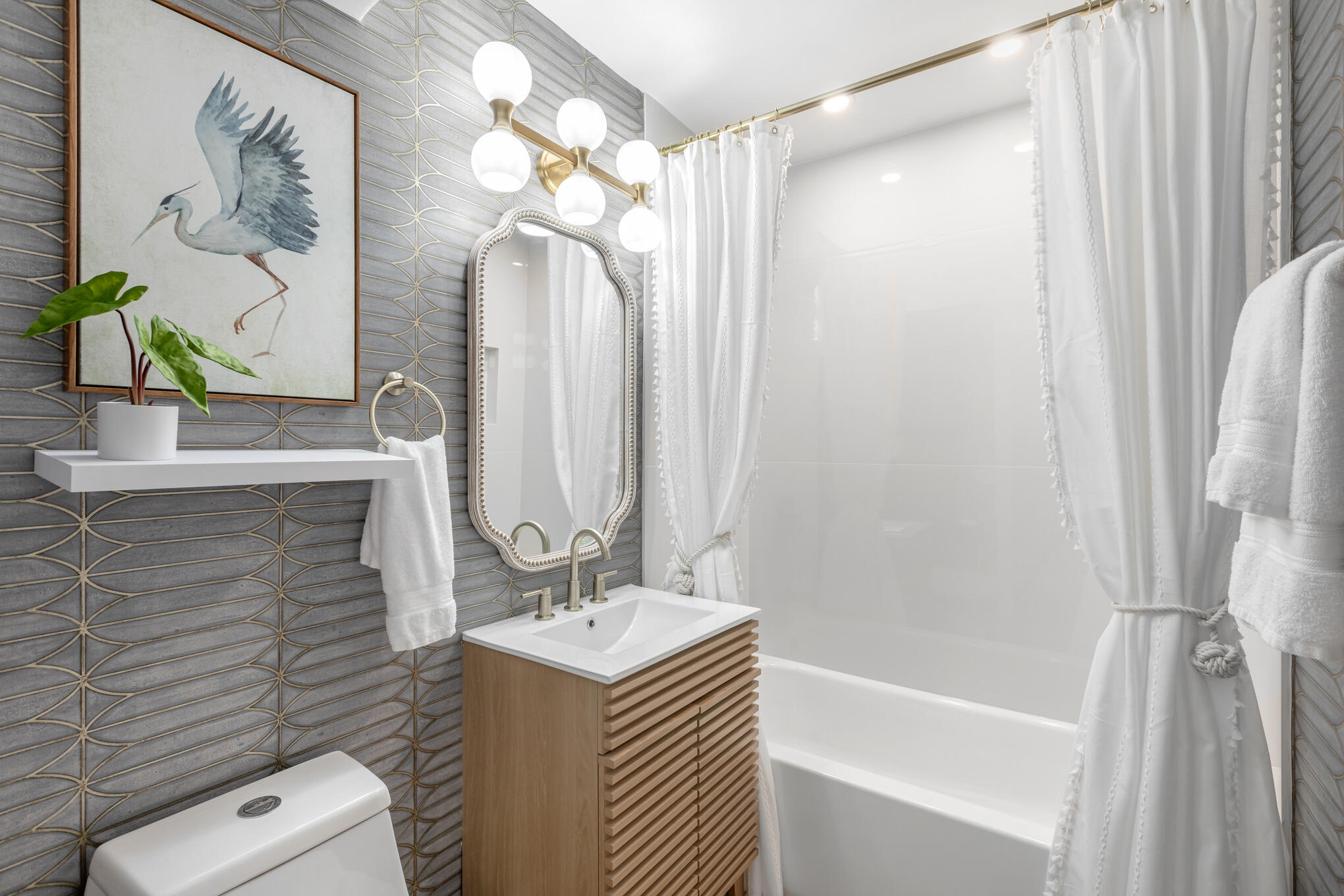 1701 Atlantic Boulevard Key West, FL 33040 - Photo 24 of 39 a bathroom with a granite countertop sink a toilet and shower