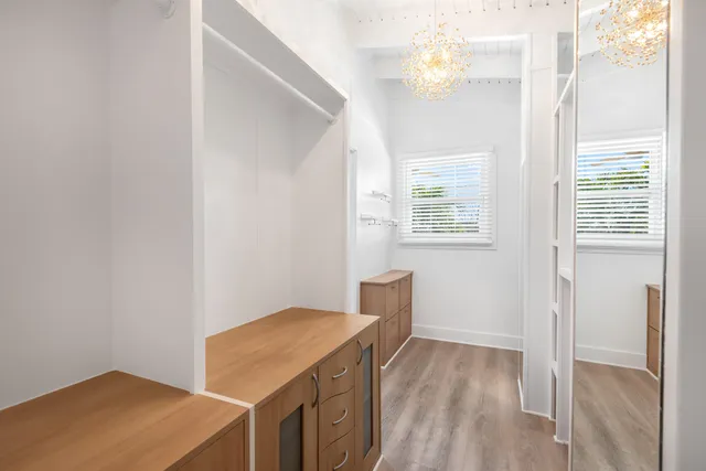 a view of a room that has a window in it