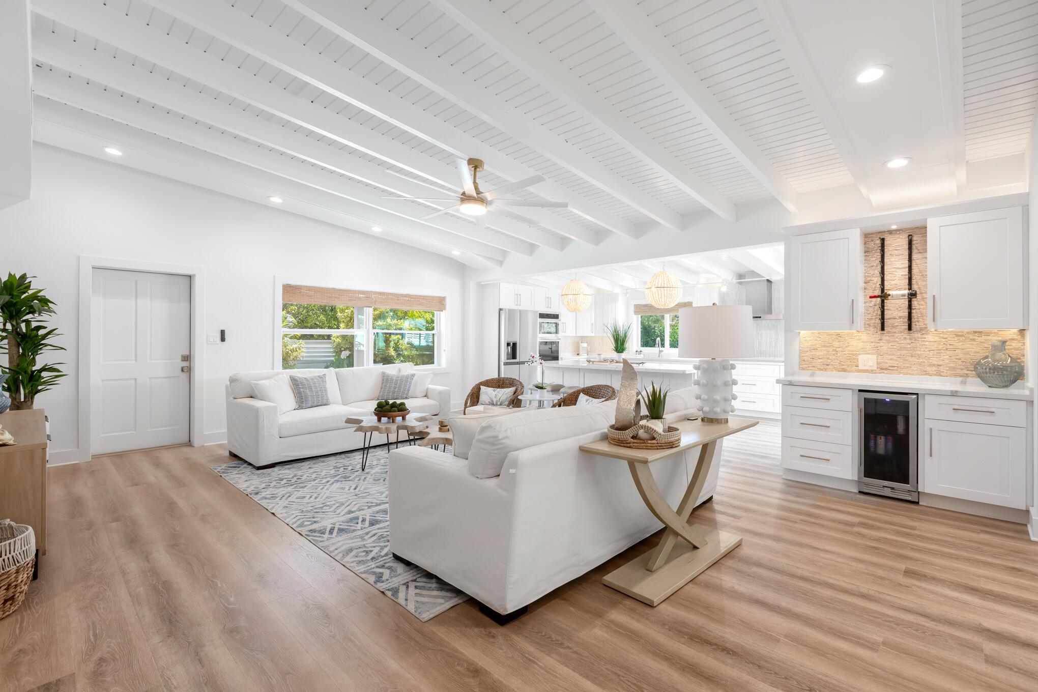 1701 Atlantic Boulevard Key West, FL 33040 - Photo 9 of 39 a living room with fireplace furniture and a wooden floor