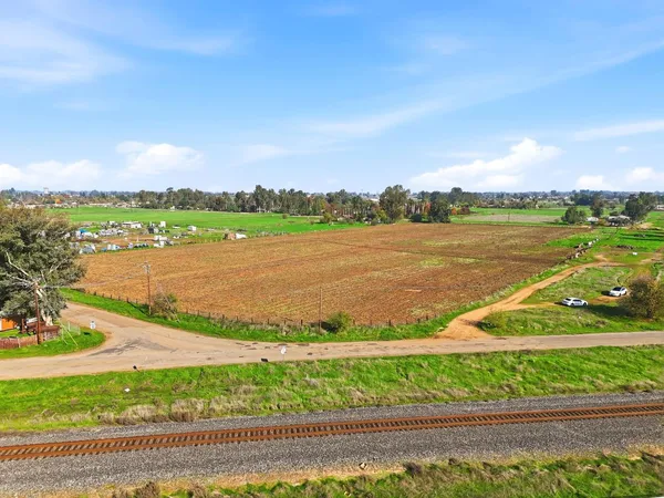 a view of a lake with a big yard