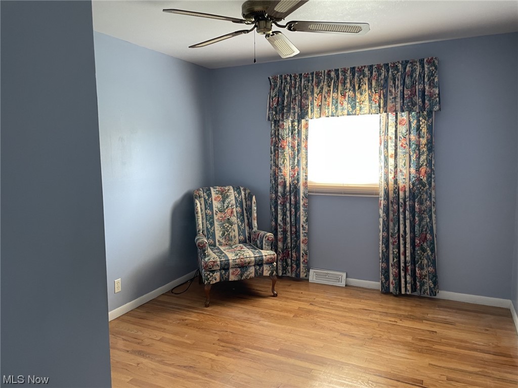 30113 Vineyard Road Willowick, OH 44095 - Photo 5 of 7 Living area featuring light hardwood flooring and ceiling fan