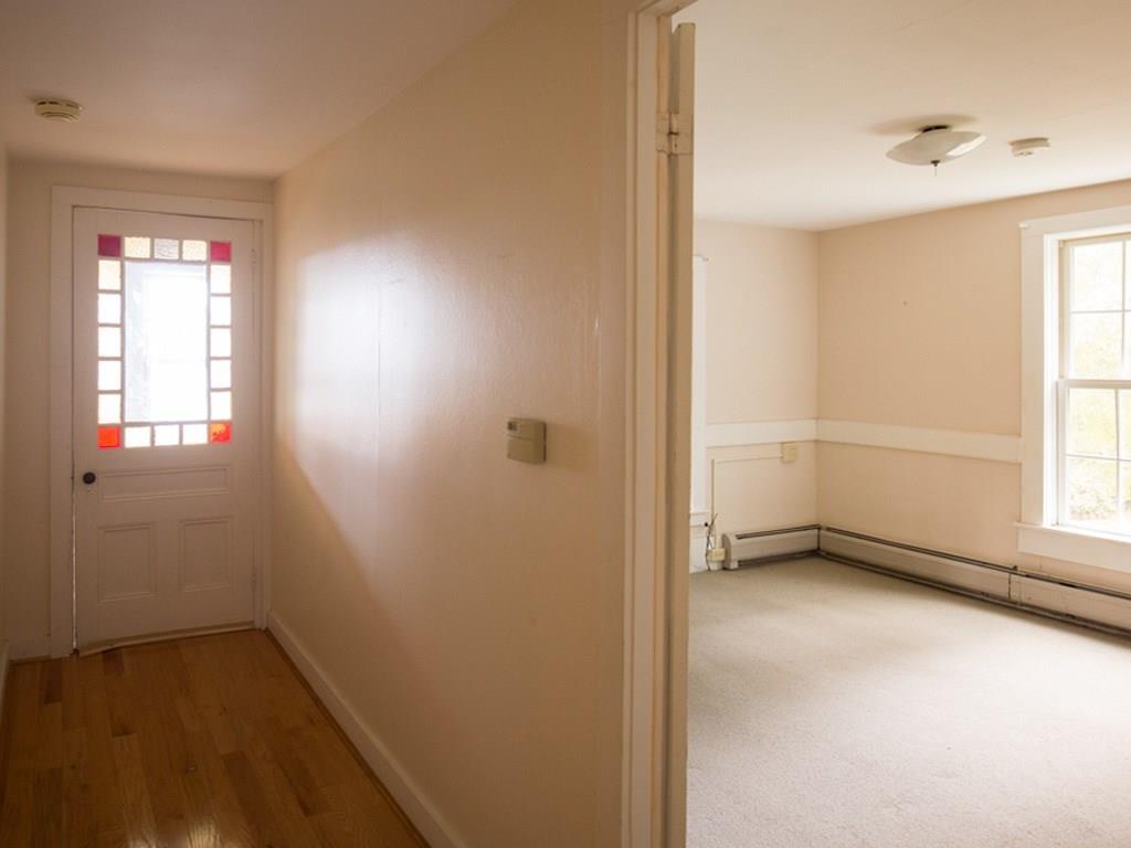 866 Princes Point Road Yarmouth, ME 04096 - Photo 17 of 27 Hallway with stained glass door and...