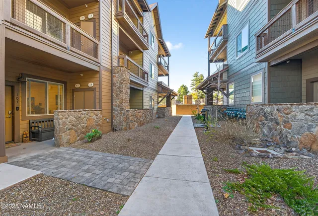 a view of a pathway with a house