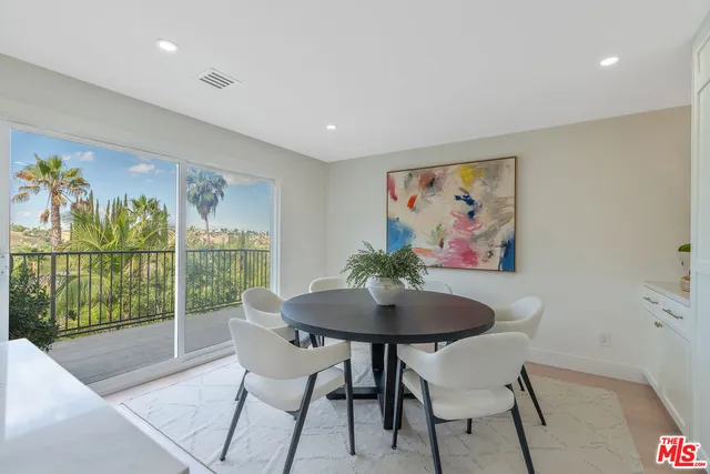 a view of a livingroom and dining room