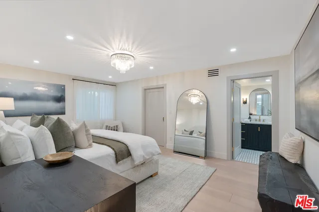 a bathroom with 2 sink and a mirror