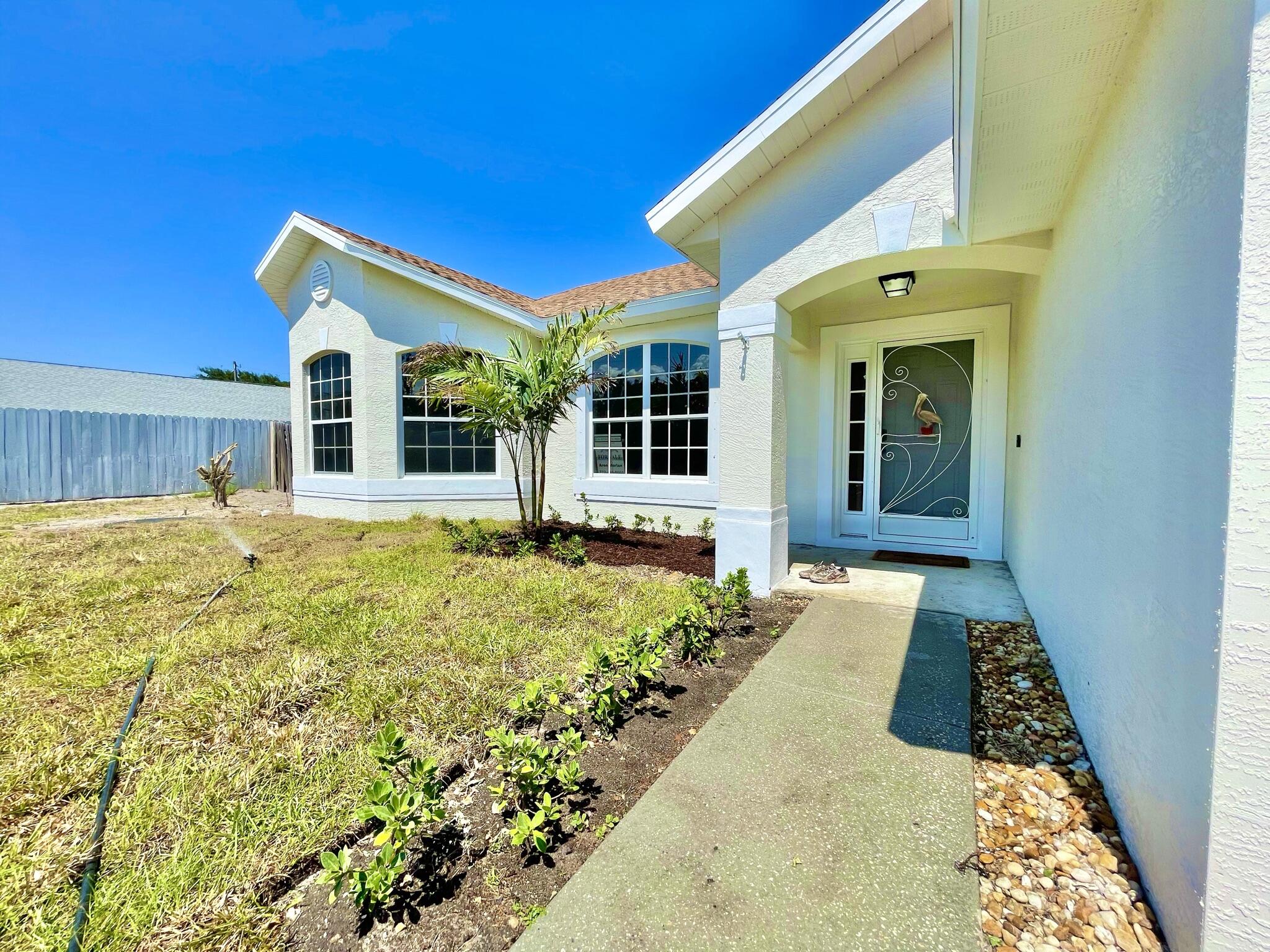 1741 Southeast Flintlock Road Port St. Lucie, FL 34952 - Photo 2 of 28 IMG_9681