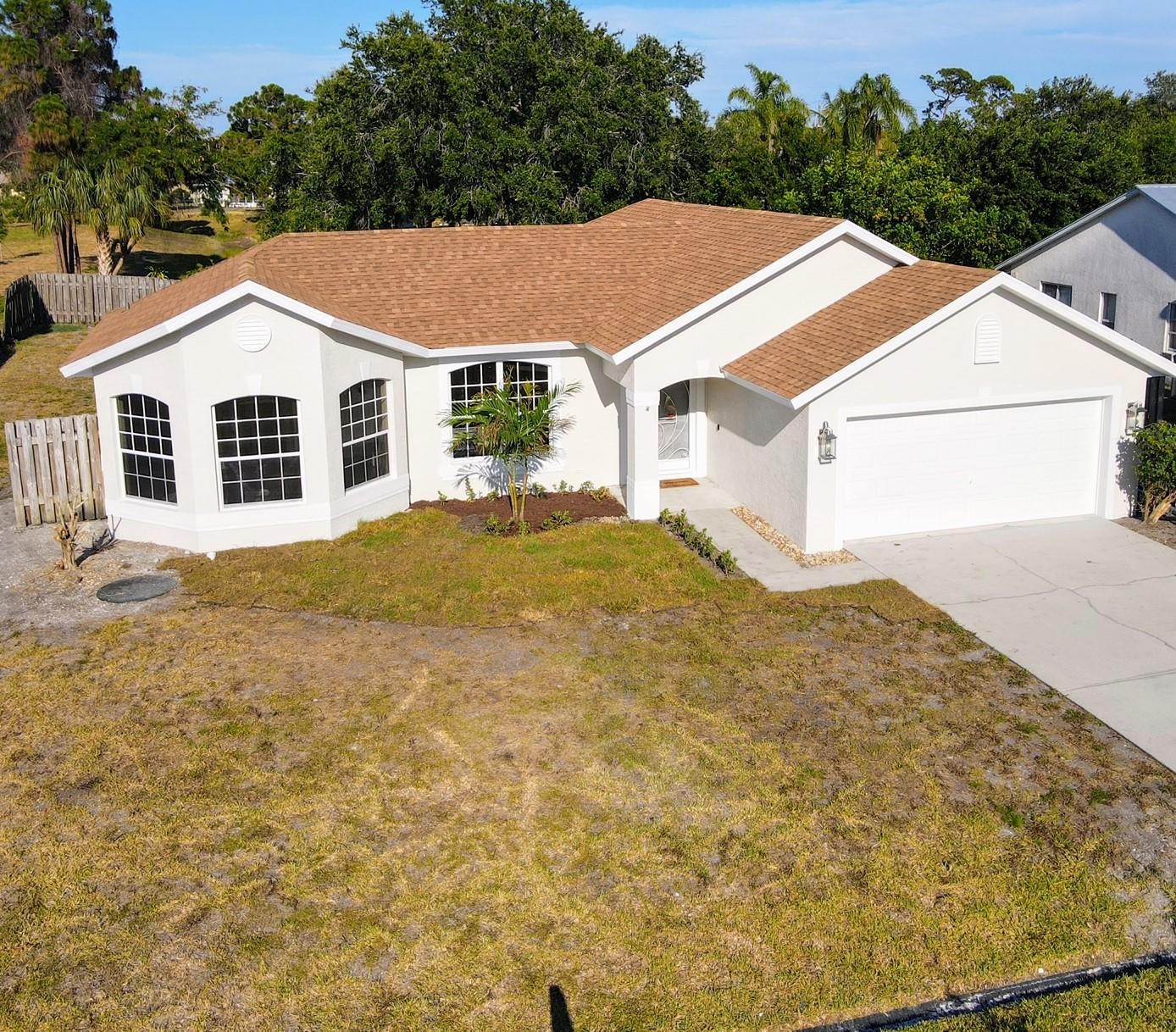 1741 Southeast Flintlock Road Port St. Lucie, FL 34952 - Photo 27 of 28 Photo_1080295504_DJI_80_jpg_6555627_0_20