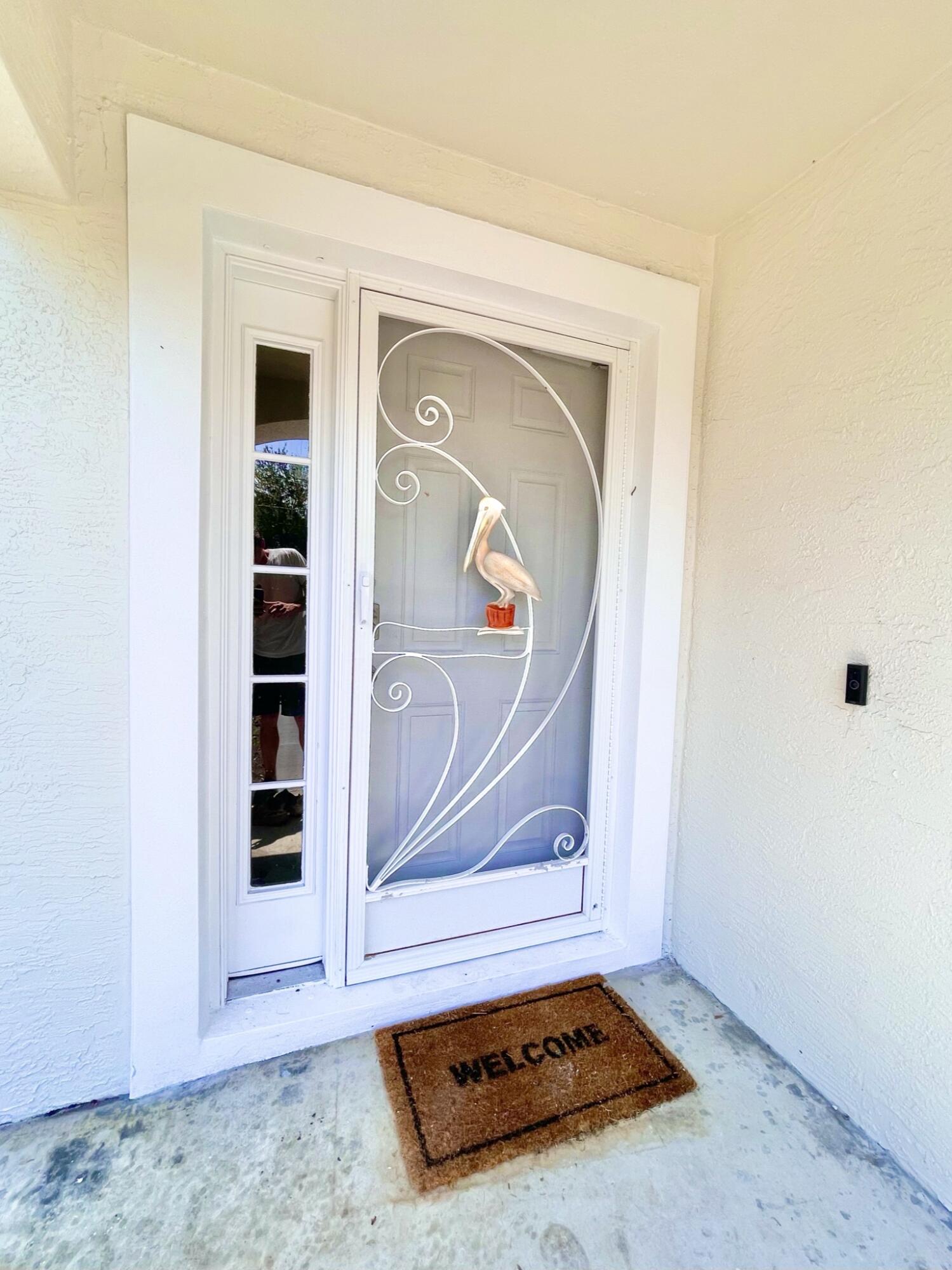 1741 Southeast Flintlock Road Port St. Lucie, FL 34952 - Photo 3 of 28 IMG_9678