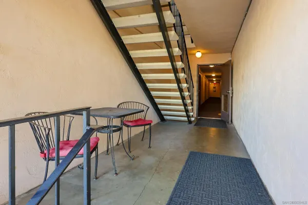 a view of entryway with stairs and furniture