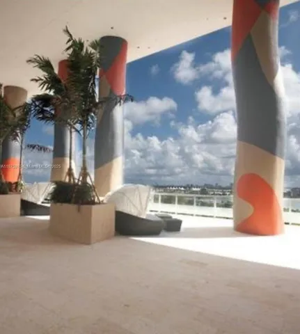 a vase of flowers sitting on a table