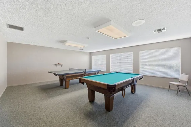 a view of livingroom with furniture wooden floor and window