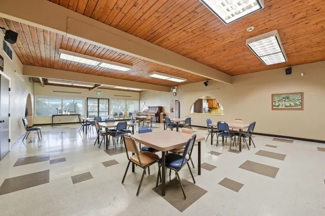 an view of outdoor space with playground and green space