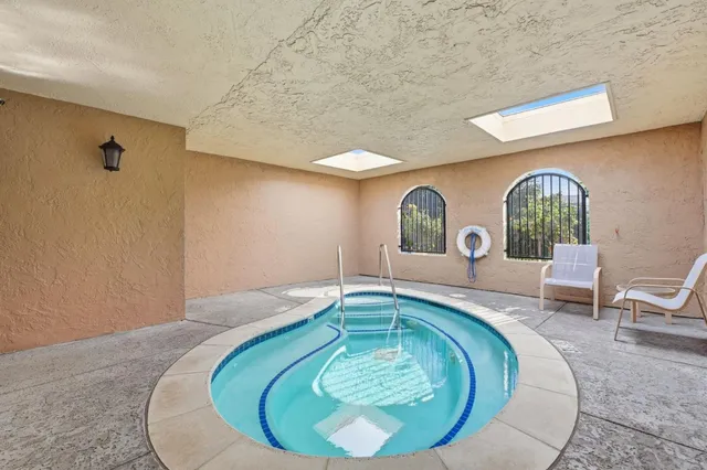 a view of a house with backyard