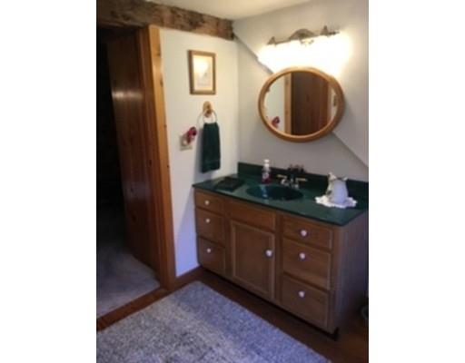 271 Thompson Road Colrain, MA 01340 - Photo 14 of 16 a bathroom with a sink and a mirror
