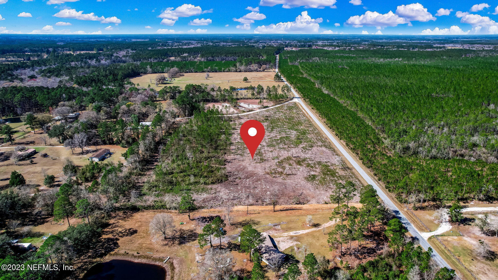 Lot 2 Rowe Road Hilliard, FL 32046 - Photo 2 of 9 a view of a yard with an outdoor space