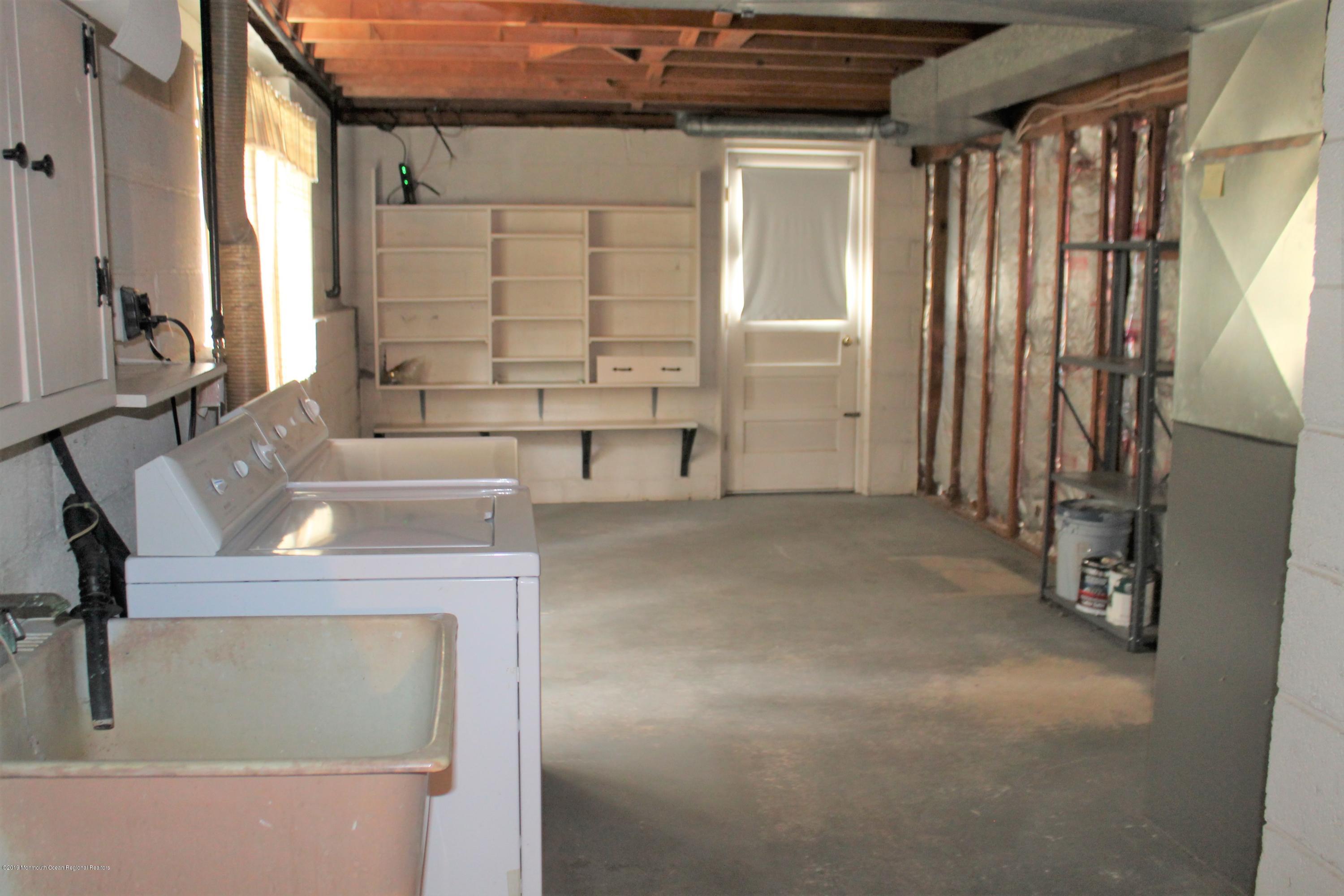 753 Colts Neck Road Freehold, NJ 07728 - Photo 18 of 24 basement laundry