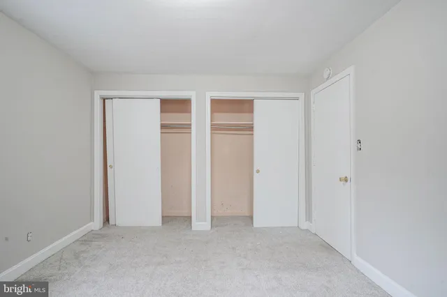 an empty room with closet