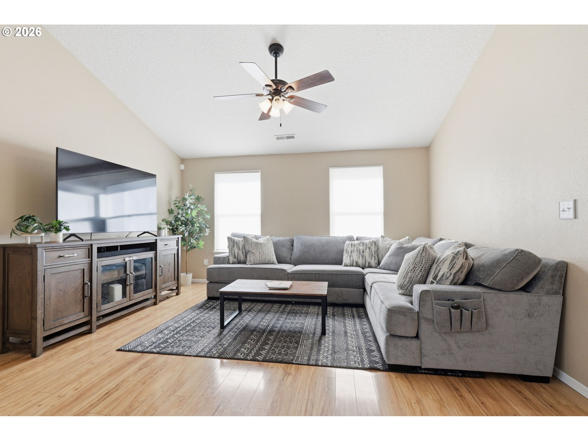 227 West 14th Street Lafayette, OR 97127 - Photo 11 of 36 a living room with furniture and a fireplace