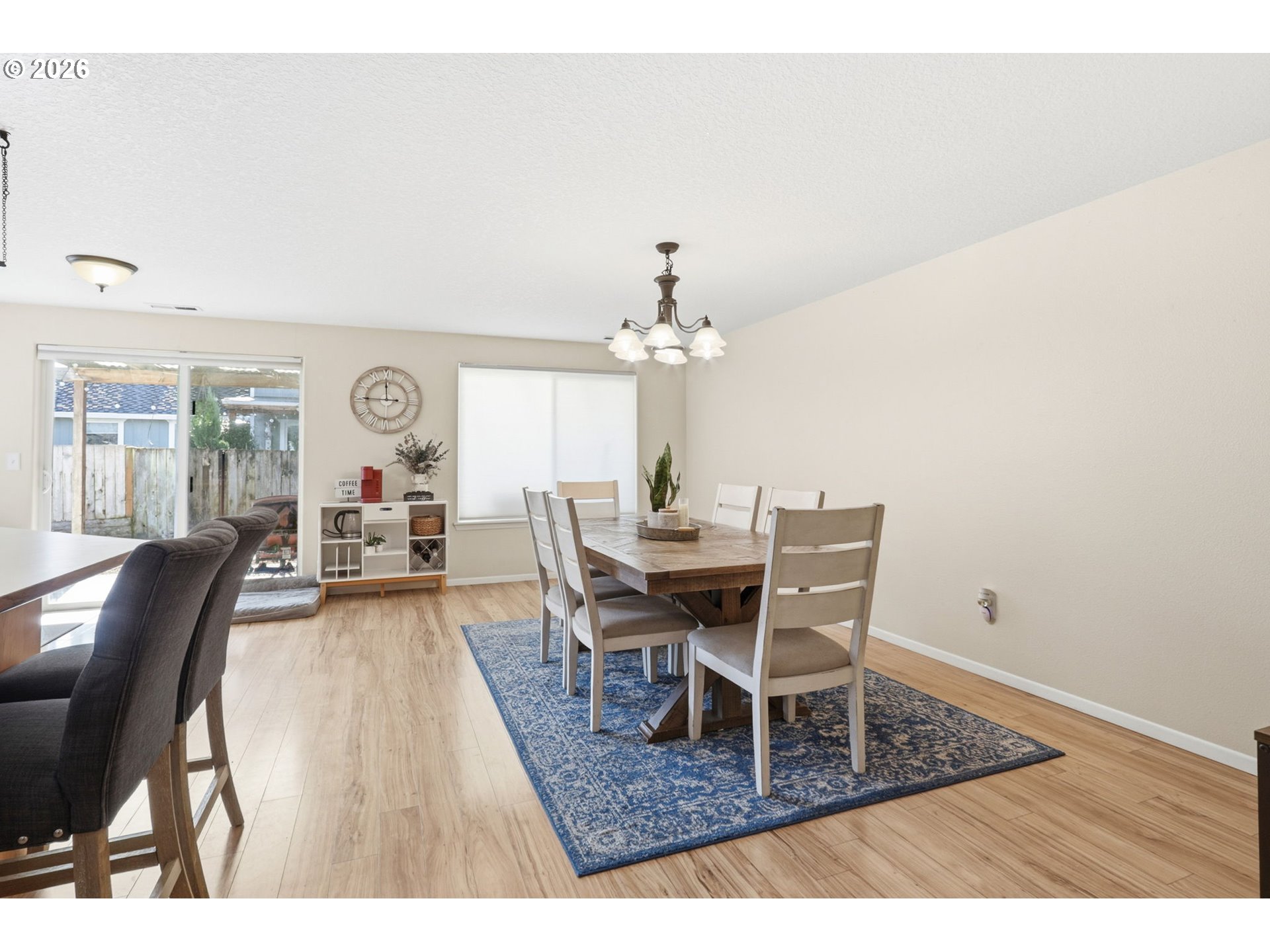 227 West 14th Street Lafayette, OR 97127 - Photo 22 of 36 a dining room with furniture a rug and wooden floor
