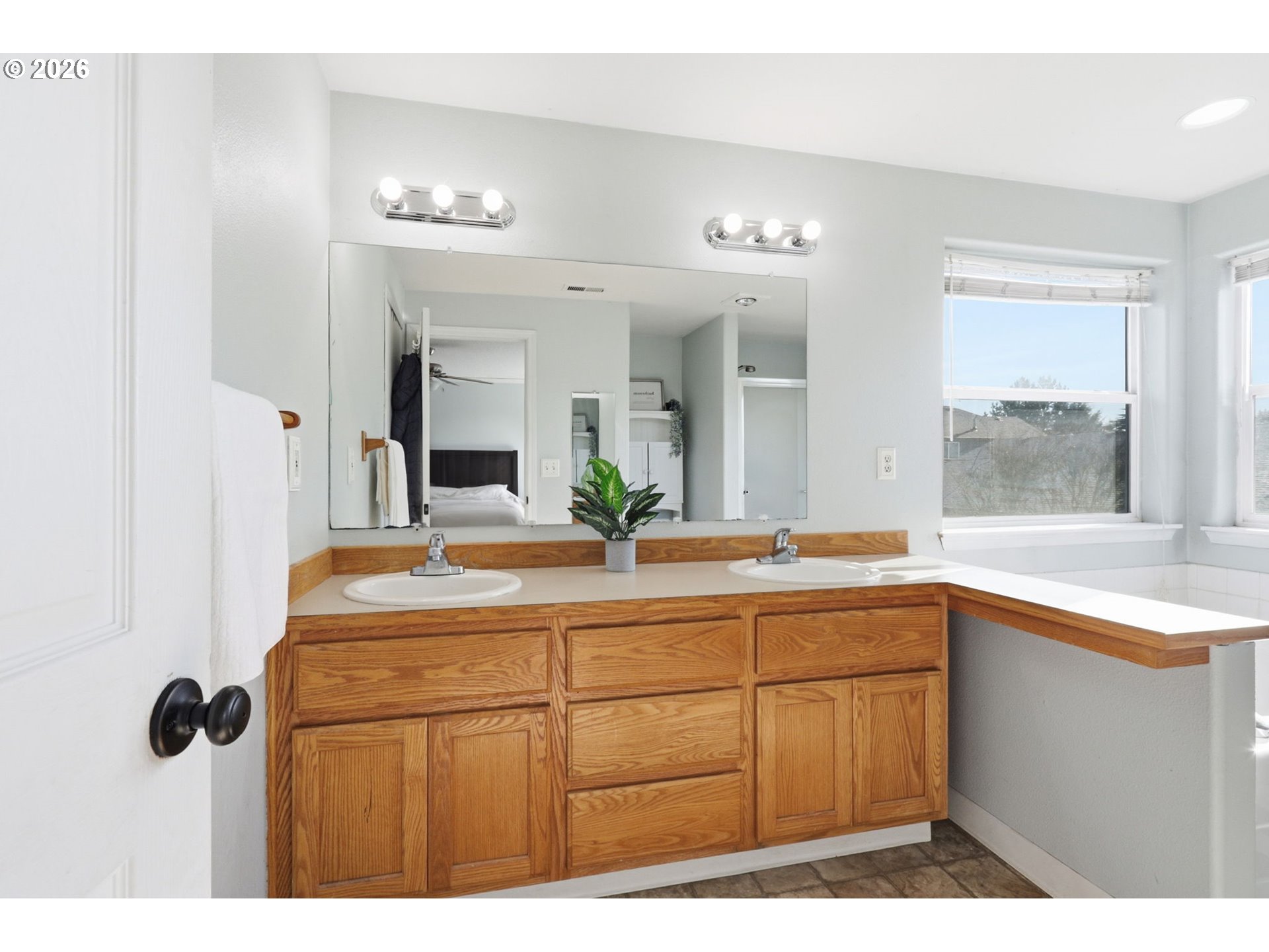 227 West 14th Street Lafayette, OR 97127 - Photo 28 of 36 a bathroom with a sink and a mirror