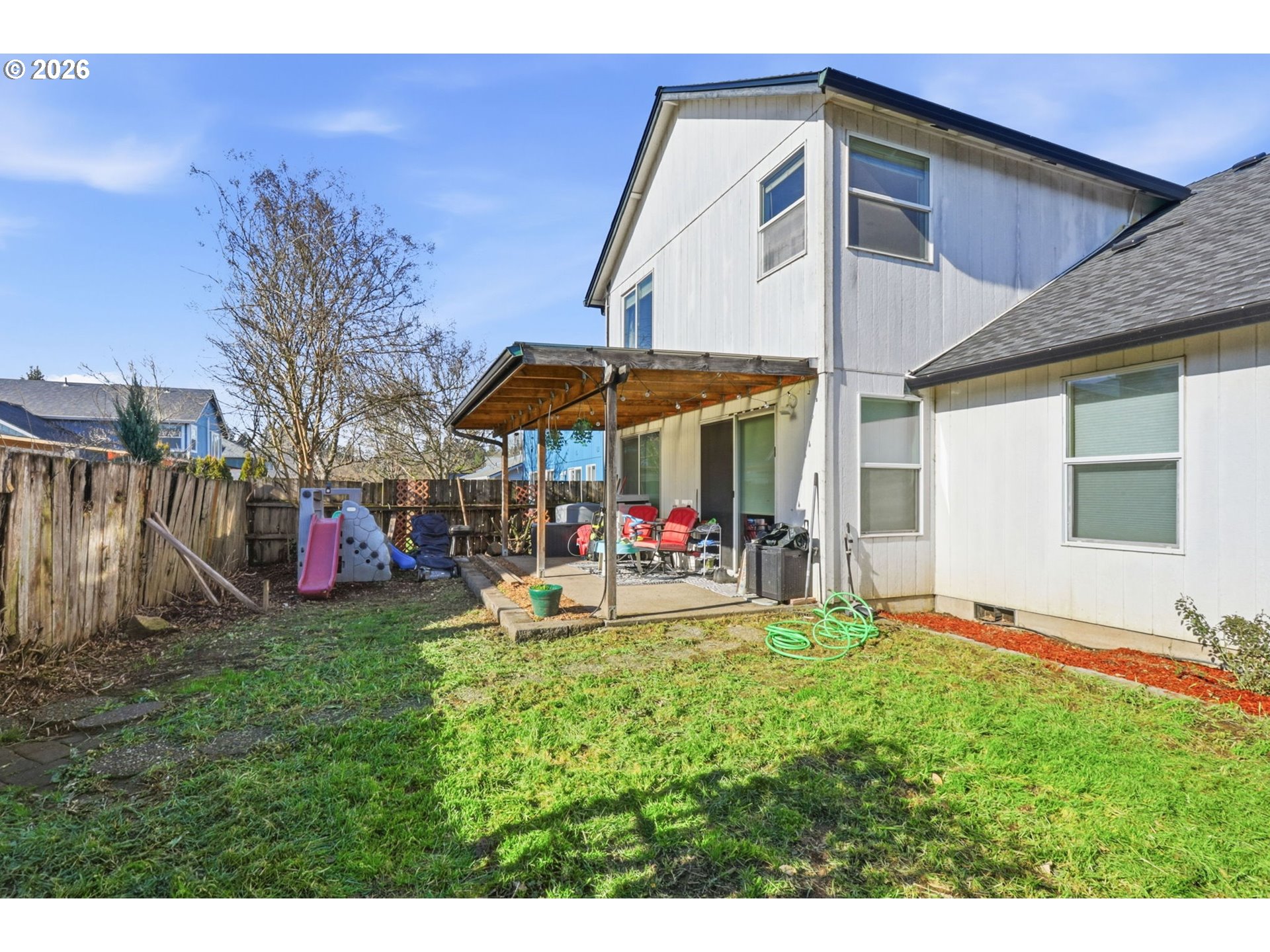 227 West 14th Street Lafayette, OR 97127 - Photo 35 of 36 a view of a house with a yard and sitting area