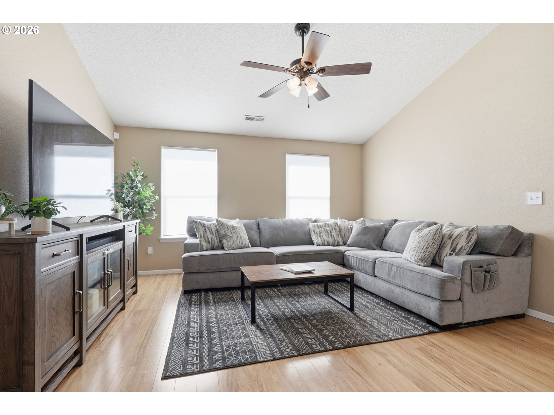 227 West 14th Street Lafayette, OR 97127 - Photo 10 of 36 a living room with furniture and a wooden floor