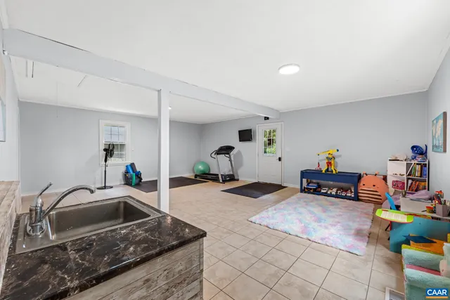 a bedroom with furniture and a couch