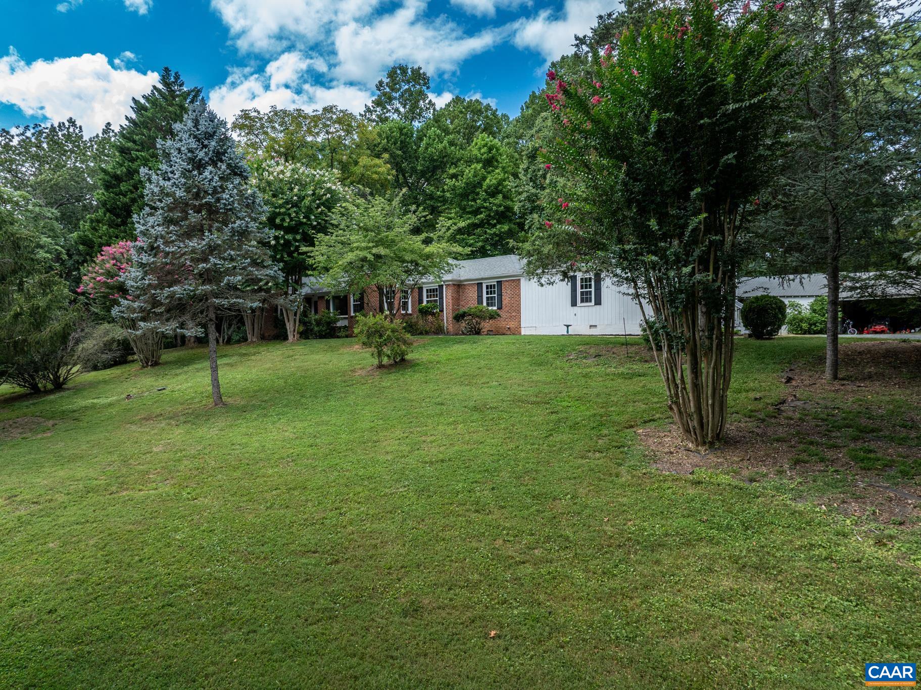 3304 Keswick Road Keswick, VA 22947 - Photo 29 of 38 a view of a house with a backyard