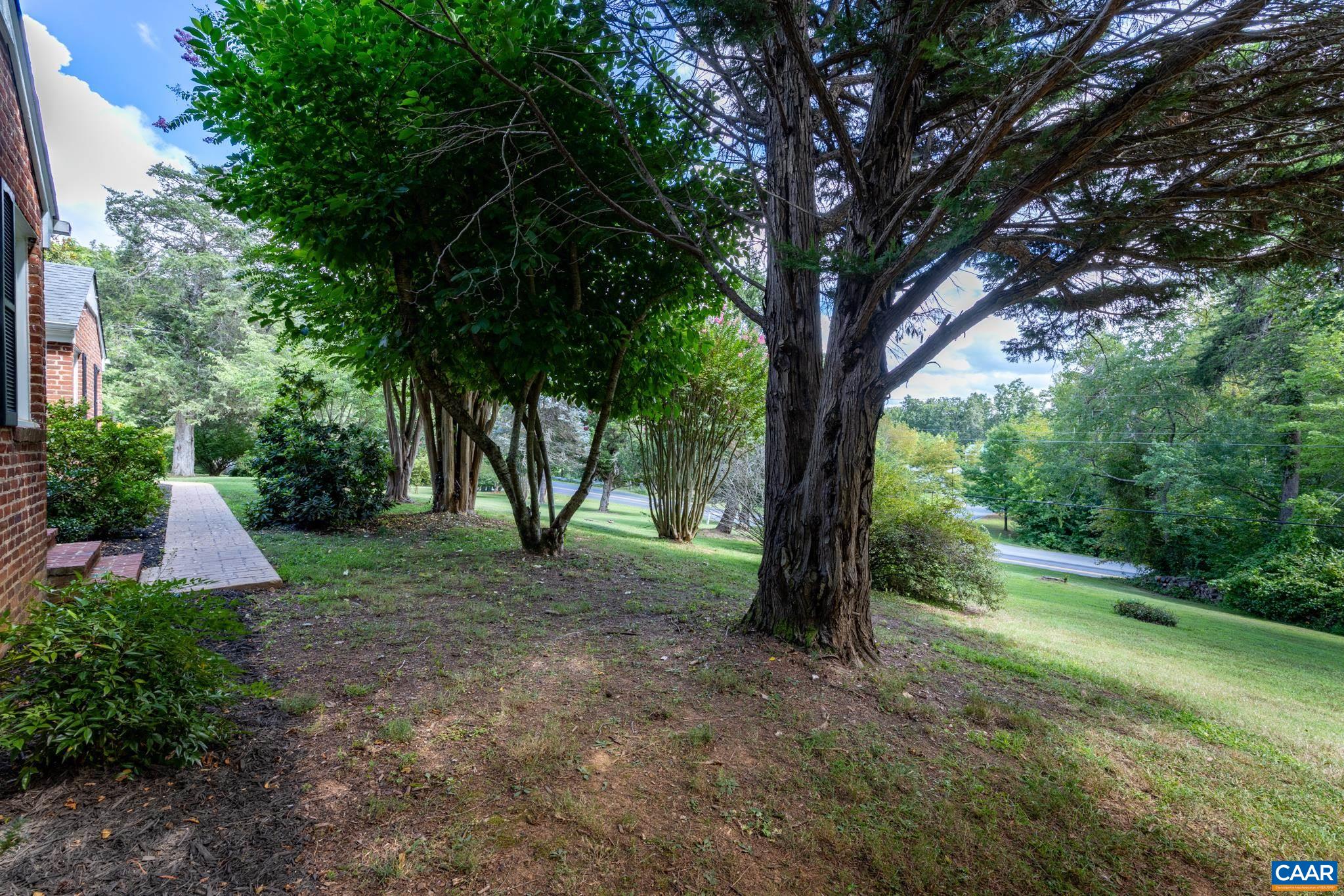 3304 Keswick Road Keswick, VA 22947 - Photo 30 of 38 a view of a yard with large trees