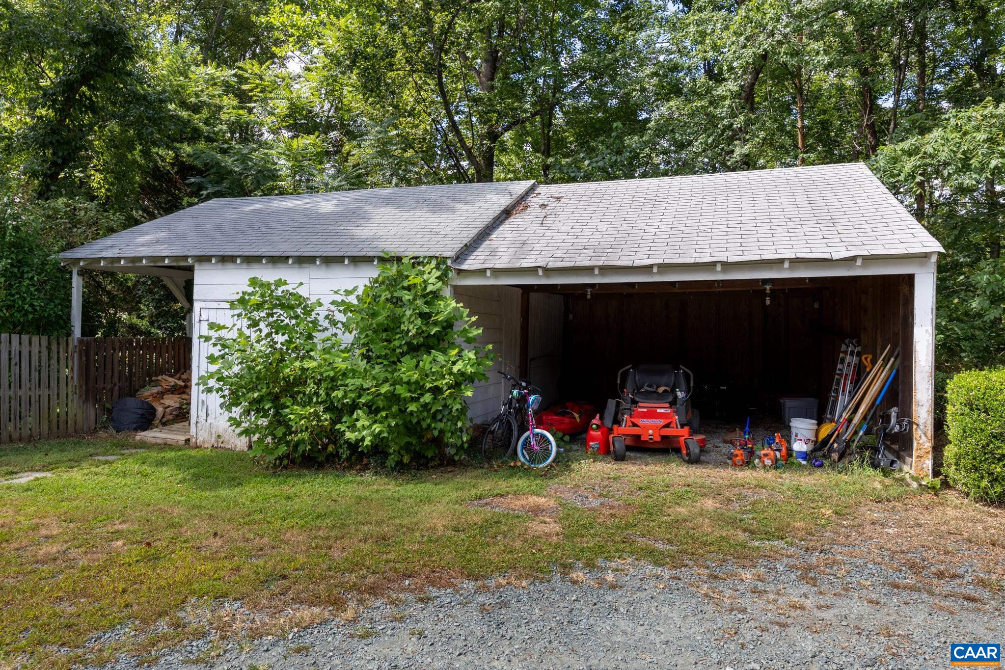 3304 Keswick Road Keswick, VA 22947 - Photo 37 of 38 a view of an house with backyard space and garden