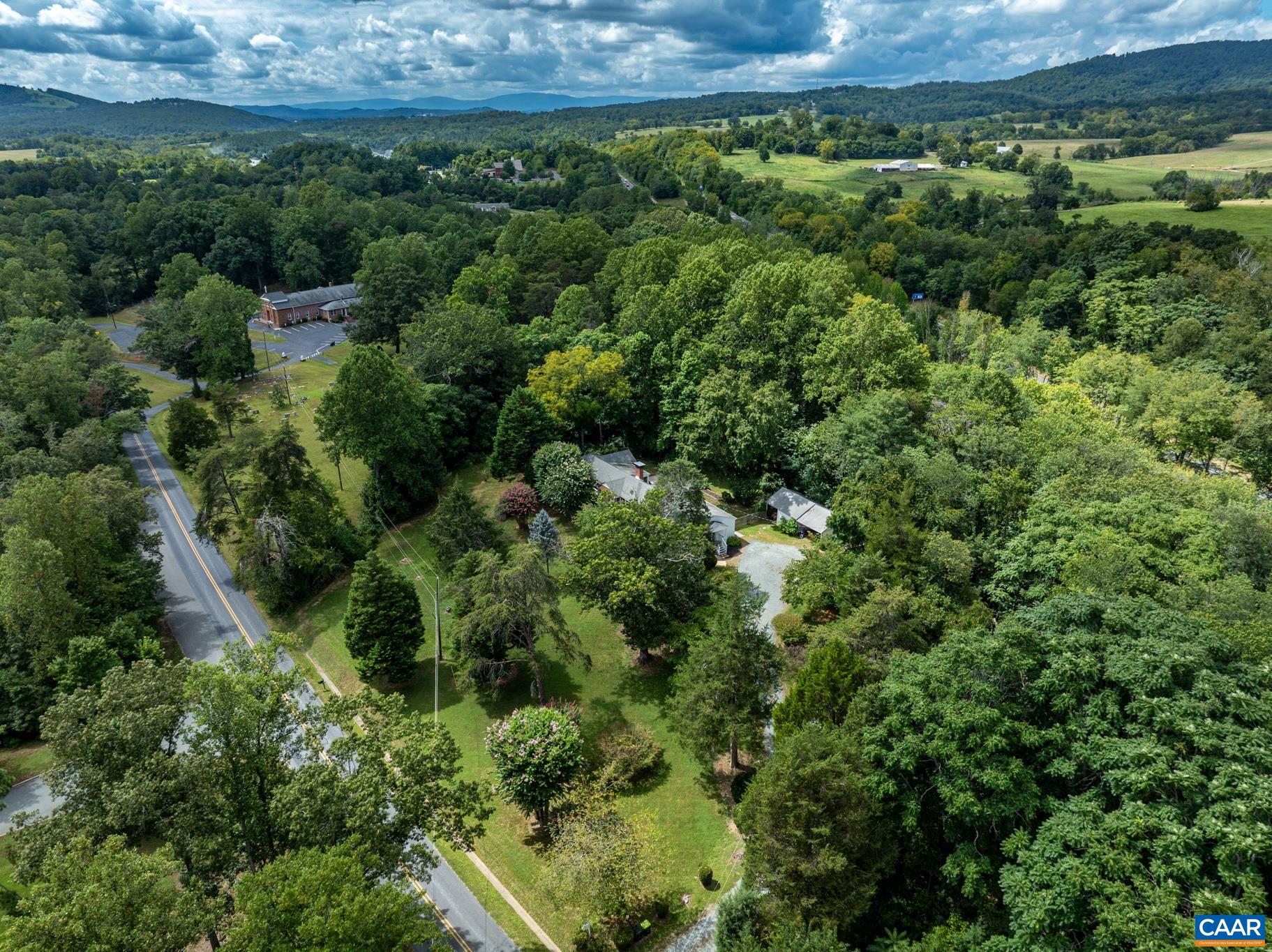 3304 Keswick Road Keswick, VA 22947 - Photo 38 of 38 an aerial view of a house with a yard
