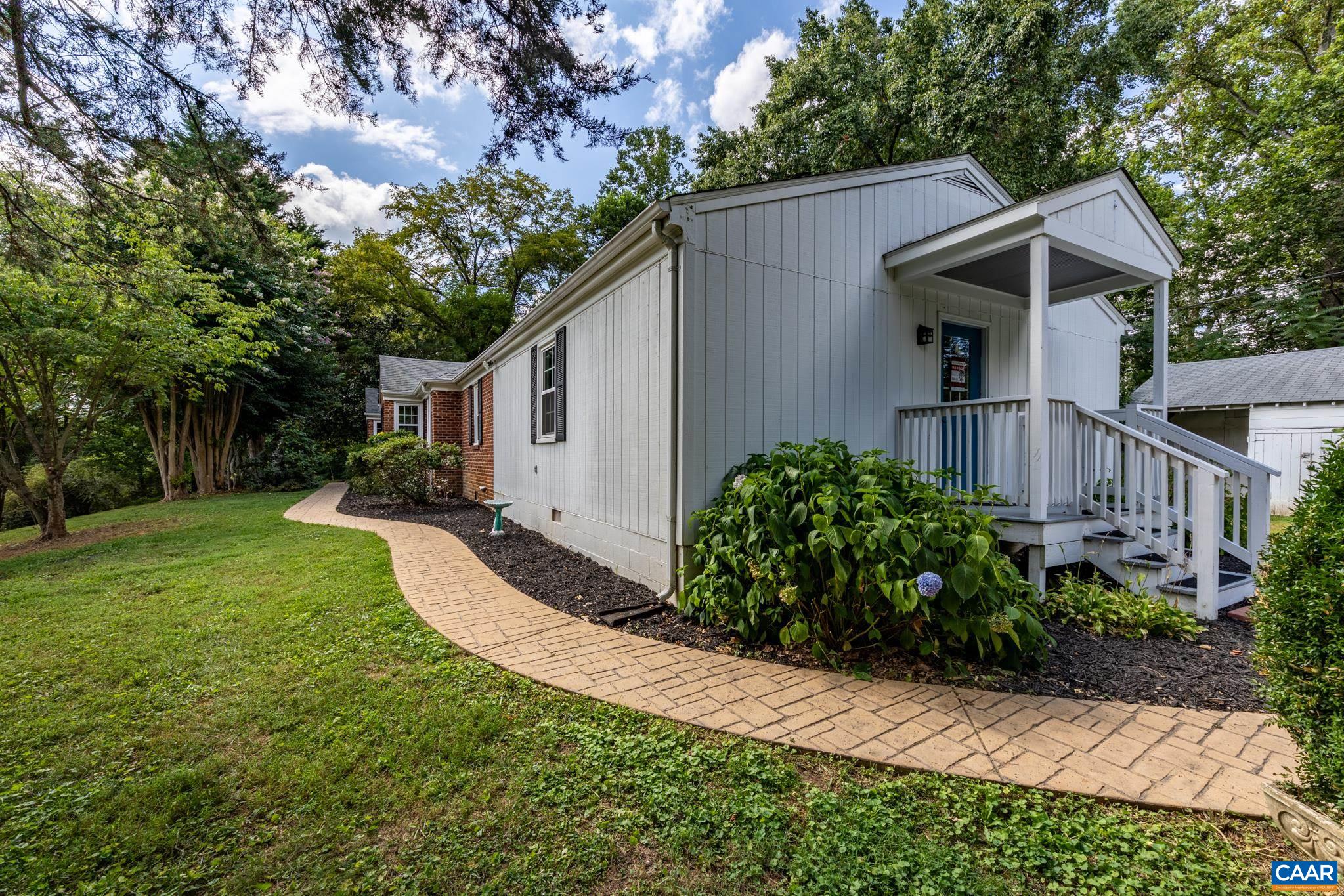 3304 Keswick Road Keswick, VA 22947 - Photo 7 of 38 a view of a house with backyard and garden