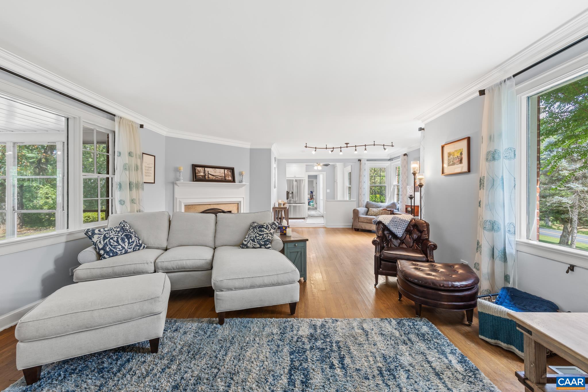 3304 Keswick Road Keswick, VA 22947 - Photo 9 of 38 a living room with furniture wooden floor and a large window