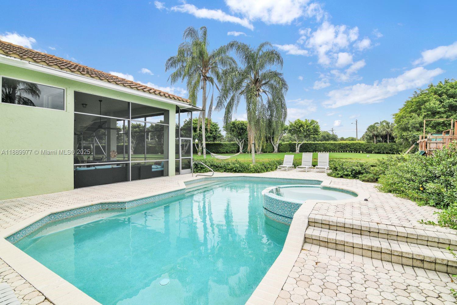 6622 Newport Lake Circle Boca Raton, FL 33496 - Photo 24 of 30 a swimming pool with outdoor space