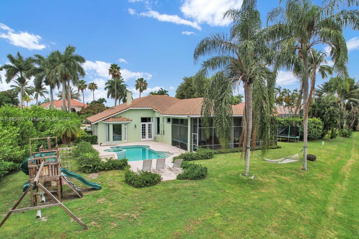 6622 Newport Lake Circle Boca Raton, FL 33496 - Photo 25 of 30 a view of a house with a backyard