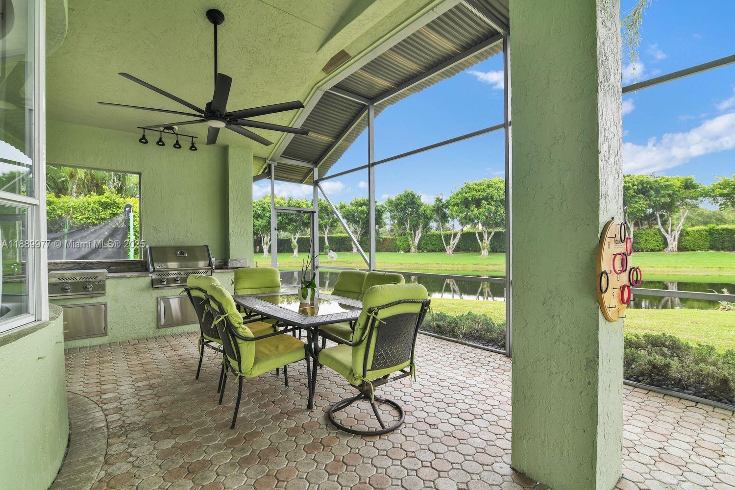 6622 Newport Lake Circle Boca Raton, FL 33496 - Photo 27 of 30 a view of a porch with chairs and backyard