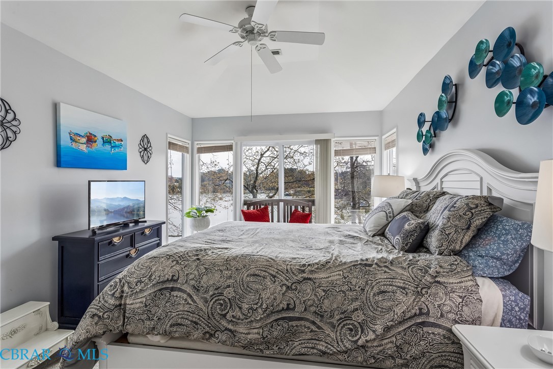172 Sturgeon Creek Road Deltaville, VA 23043 - Photo 28 of 50 Bedroom with multiple windows and a ceiling fan