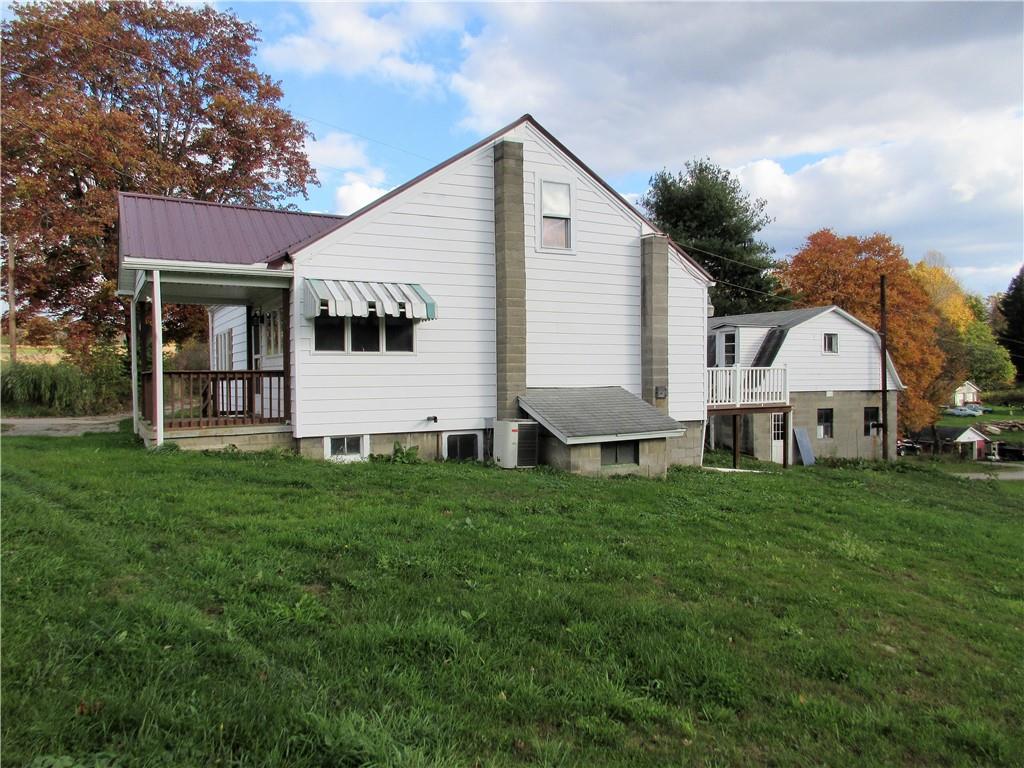993 Bartley Road Parker, PA 16049 - Photo 16 of 25 a view of a house with backyard