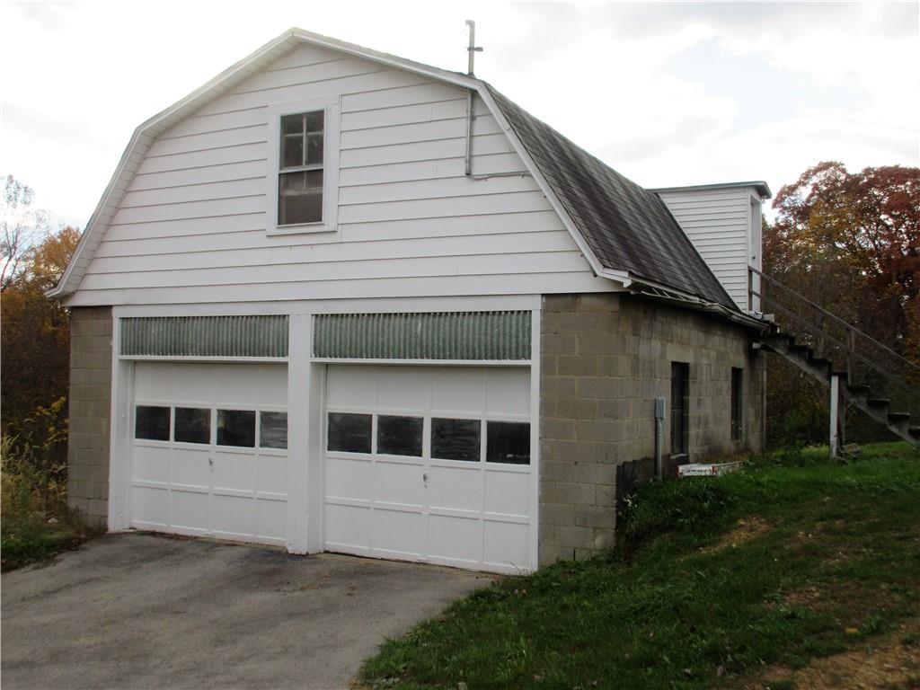 993 Bartley Road Parker, PA 16049 - Photo 18 of 25 a large white house with a large window