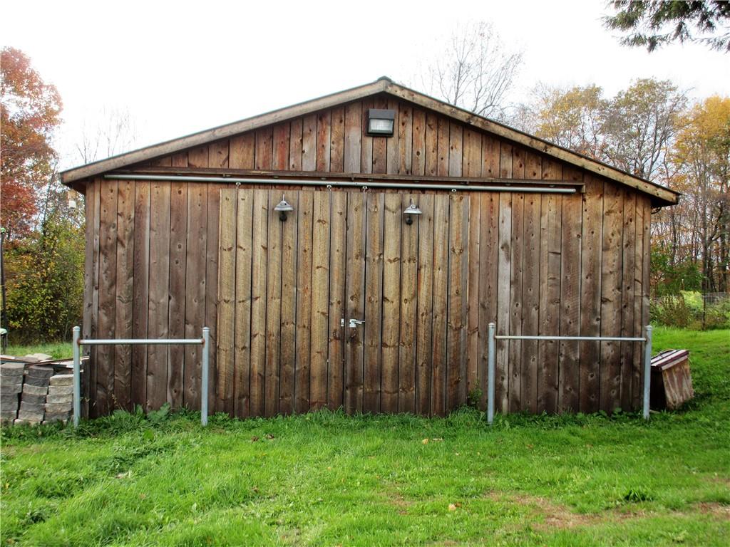993 Bartley Road Parker, PA 16049 - Photo 19 of 25 a backyard of a house with wooden fence