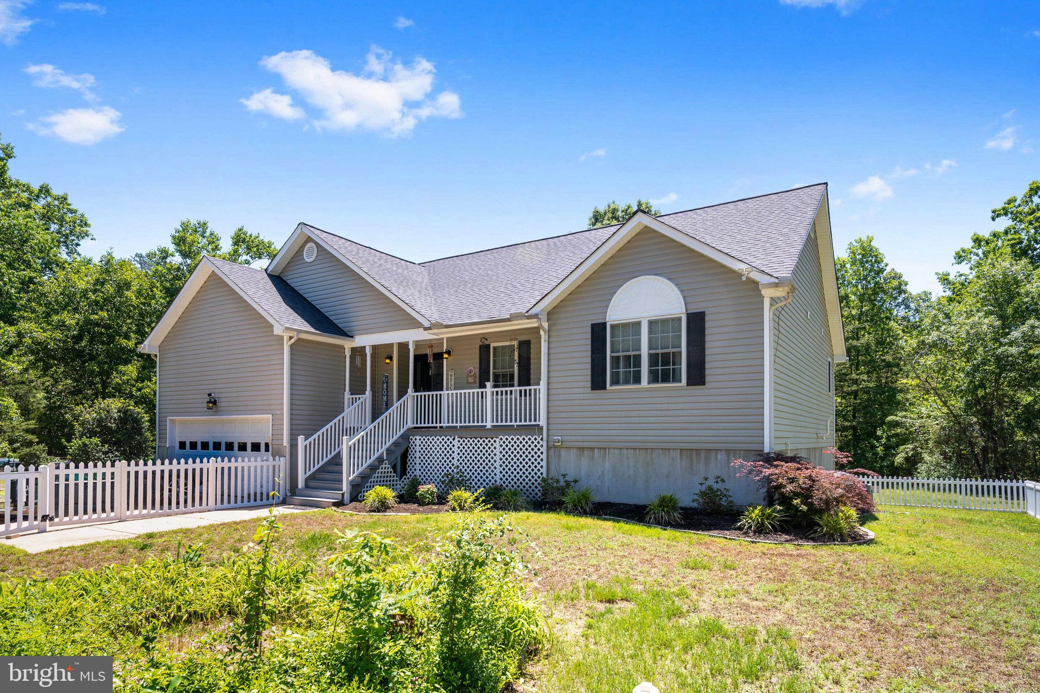 8009 Burrell Road Fredericksburg, VA 22407 - Photo 46 of 66 Charming home nestled in nature's embrace.