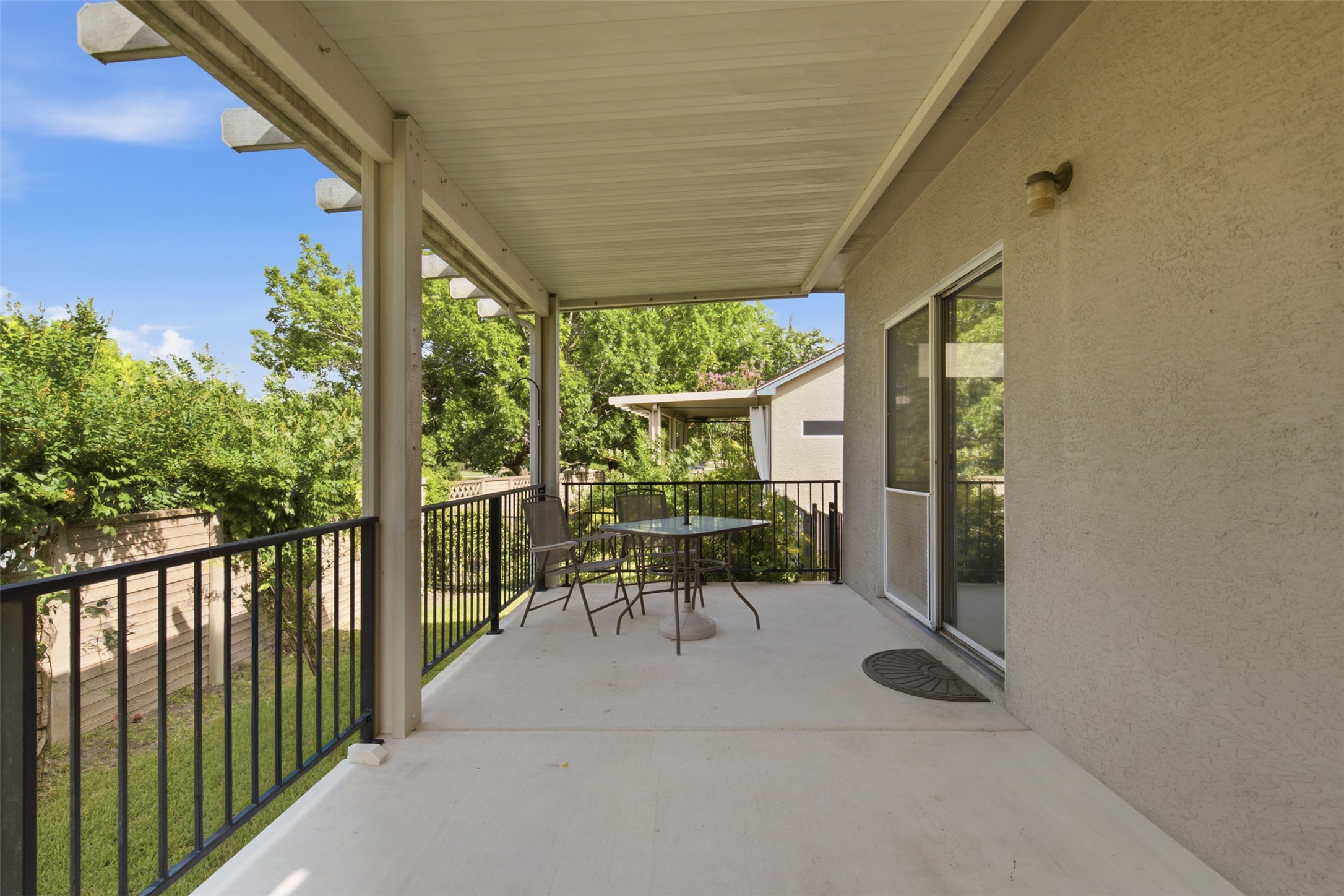 126 Whitewing Way Georgetown, TX 78633 - Photo 25 of 28 A spacious covered patio provides a delightful outdoor living extension.